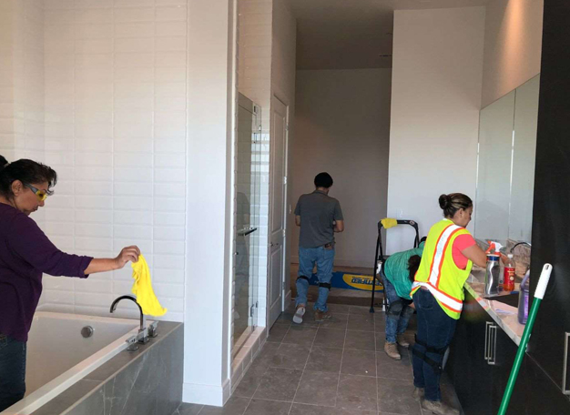 Crew completing a detailed interior construction clean